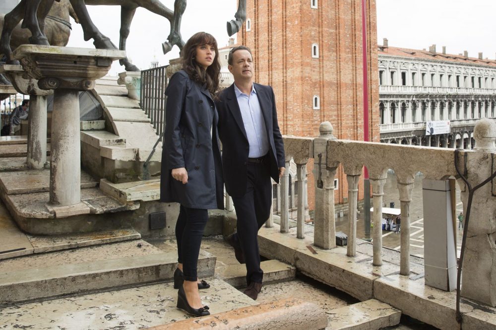Langdon (Tom Hanks) and Sienna (Felicity Jones) on the balcony of St. Marks Basilica in Columbia Pictures' INFERNO.